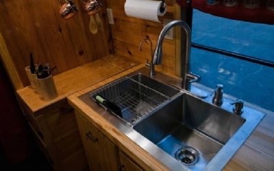 Photo of a 2007 Freightliner FS-65 Digital Nomad Skoolie Motorhome for sale