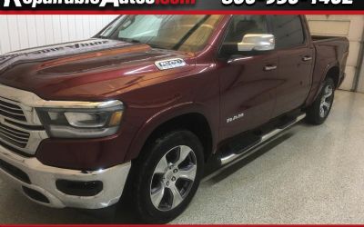 Photo of a 2019 RAM 1500 Laramie Crew Cab 4WD Repairable Hail Damage for sale
