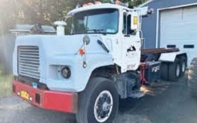 Photo of a 1997 Mack Roll Off Roll Off Truck for sale