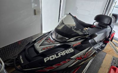 Photo of a 2005 Polaris Snowmobiles With A Thule Snopro Three Place Trailer And 2003 for sale